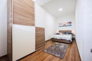 Postel nebo postele na pokoji v ubytování Apartment Karla