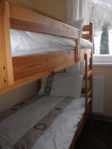 Postel nebo postele na pokoji v ubytování Soča House