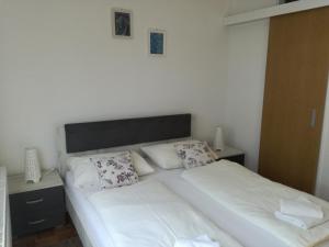 Postel nebo postele na pokoji v ubytování Guesthouse Šebalj