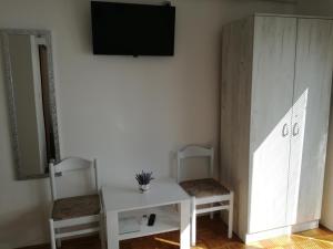 TV a/nebo společenská místnost v ubytování Guesthouse Šebalj