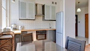 Kuchnia lub aneks kuchenny w obiekcie Dom & House - Apartments Parkur Sopot