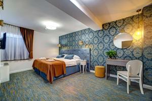 Postel nebo postele na pokoji v ubytování Hotel Skradinski Buk