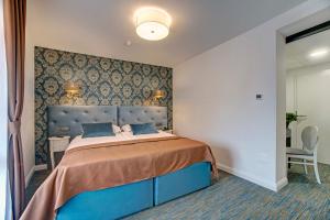 Postel nebo postele na pokoji v ubytování Hotel Skradinski Buk