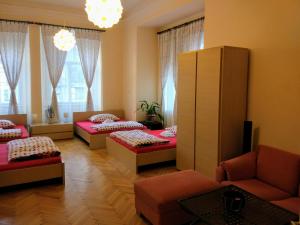 Postel nebo postele na pokoji v ubytování Apartments Týnská 7