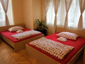 Postel nebo postele na pokoji v ubytování Apartments Týnská 7