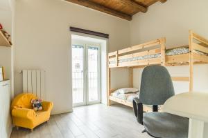 Voodi või voodid majutusasutuse SANT'ANDREA APARTMENT toas