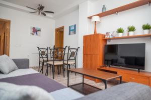 A television and/or entertainment centre at Apartment SolMar