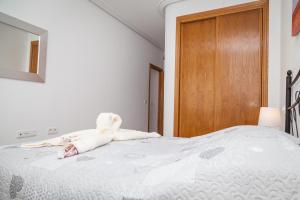A bed or beds in a room at Apartment SolMar