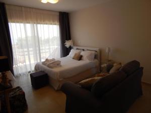 Postel nebo postele na pokoji v ubytování Apartments Aliki