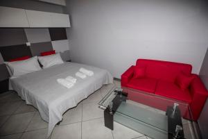 Postel nebo postele na pokoji v ubytování Trendy Living in Monastiraki