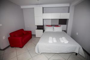 Postel nebo postele na pokoji v ubytování Trendy Living in Monastiraki