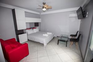 Postel nebo postele na pokoji v ubytování Trendy Living in Monastiraki