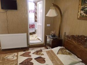 Voodi või voodid majutusasutuse Tamar Guest House toas