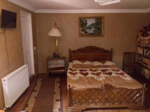Voodi või voodid majutusasutuse Tamar Guest House toas