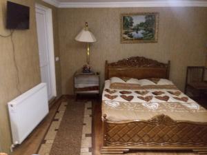 Voodi või voodid majutusasutuse Tamar Guest House toas