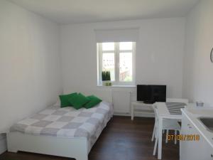 Łóżko lub łóżka w pokoju w obiekcie Stay99