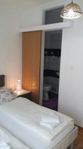 Postel nebo postele na pokoji v ubytování Guesthouse Šebalj