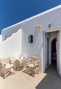 A seating area at Alexandra Mykonos Port
