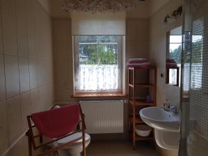a bathroom with a sink and a window at Willa Reverans in Borne Sulinowo +87 photos