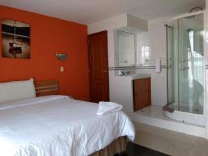 Koupelna v ubytování Libertad Hotel