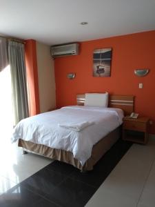 Postel nebo postele na pokoji v ubytování Libertad Hotel