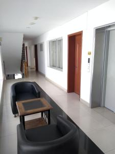 Posezení v ubytování Libertad Hotel
