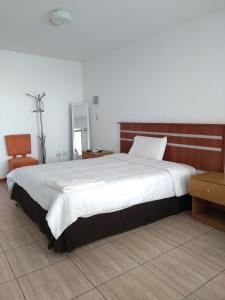 Postel nebo postele na pokoji v ubytování Libertad Hotel + 37 fotografií