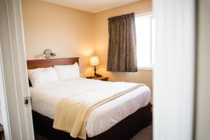 Cama o camas de una habitación en Carmel Inn