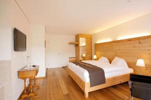 Postel nebo postele na pokoji v ubytování Bären - Das Gästehaus