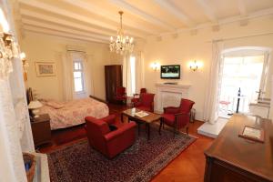 Televízia a/alebo spoločenská miestnosť v ubytovaní Antunini Studio Apartment