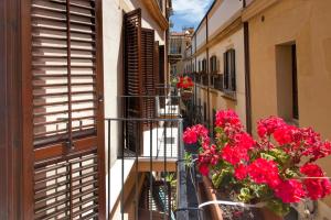 Un balcón o terraza de Apartment Domus Schiavuzzo