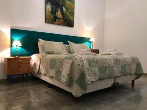 A bed or beds in a room at Molino la Tebaida