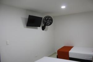 TV a/nebo společenská místnost v ubytování Hotel Pereira 421 + 32 fotografií