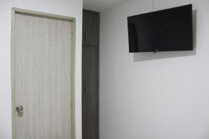 Μια τηλεόραση ή/και κέντρο ψυχαγωγίας στο Hotel Pereira 421