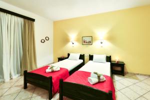 Posteľ alebo postele v izbe v ubytovaní Remezzo Studios & Apartments