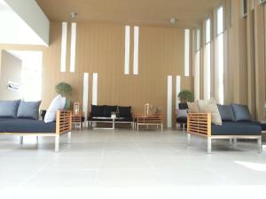 Posezení v ubytování Baan Koo Kiang by Sudarat