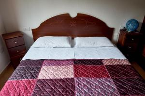 Łóżko lub łóżka w pokoju w obiekcie Villetta Stella IUN P2177