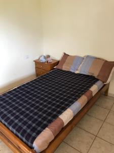 Ένα ή περισσότερα κρεβάτια σε δωμάτιο στο Taygetos