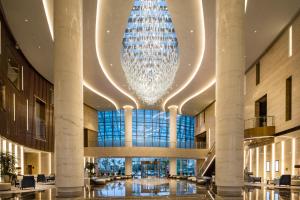 Fliport Wutong Hotel-Free Welcome Fruit & Near Exhibition Center 레스토랑 또는 맛집
