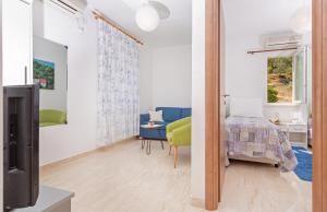 Tempat tidur dalam kamar di Apartments Elica