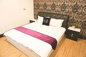 Krevet ili kreveti u jedinici u okviru objekta Donggang Hai-Wan Homestay