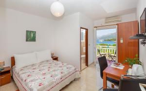 Postel nebo postele na pokoji v ubytování Apartments Elica