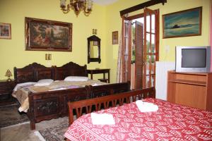 Postel nebo postele na pokoji v ubytování Katerina Hotel