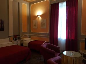 Postel nebo postele na pokoji v ubytování B&B Villa Gavina