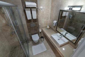 Um banheiro em Linda Resort Hotel
