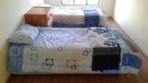 Säng eller sängar i ett rum på Paz Cottage