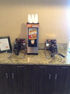 a drink machine on a counter in a hotel room at Inn America - Boise in Boise