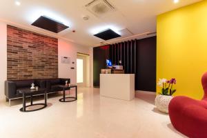 TV a/nebo společenská místnost v ubytování Boutique Hotel Esplanade