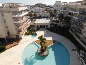 The swimming pool at or close to GMID IMMO A187 Apartamento Port Canigo