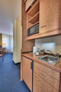 Kuchyň nebo kuchyňský kout v ubytování Hotel Residenz Limburgerhof